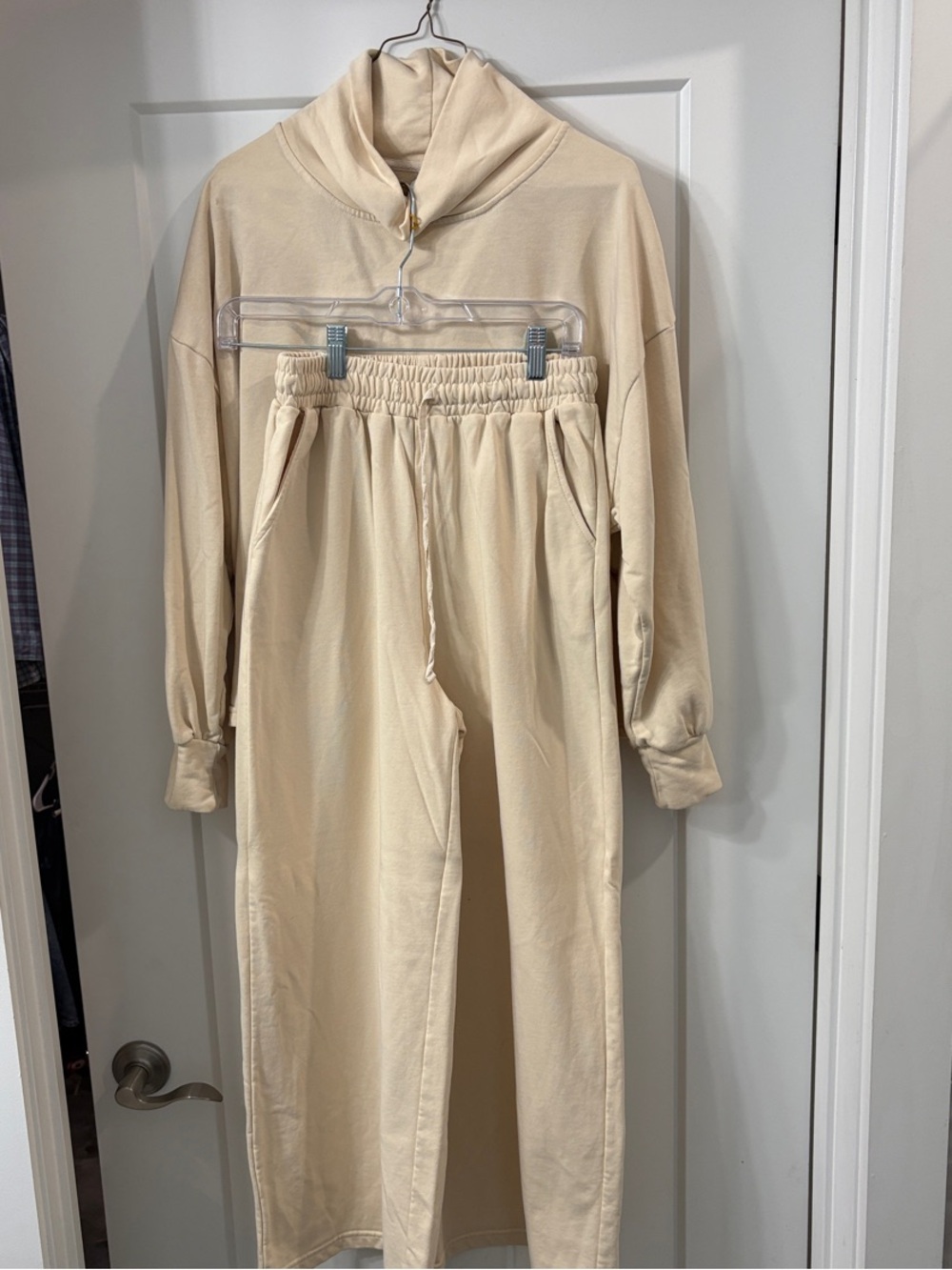 Kimberly C Cream 2 piece set.Joggers and mock neck sweatshirt.Missing drawstring